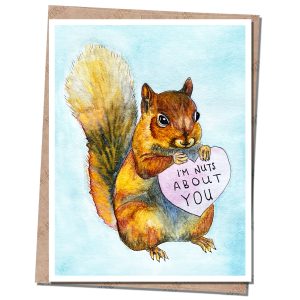 a squirrel holds a pink heart that reads "i'm nuts about you." blue background